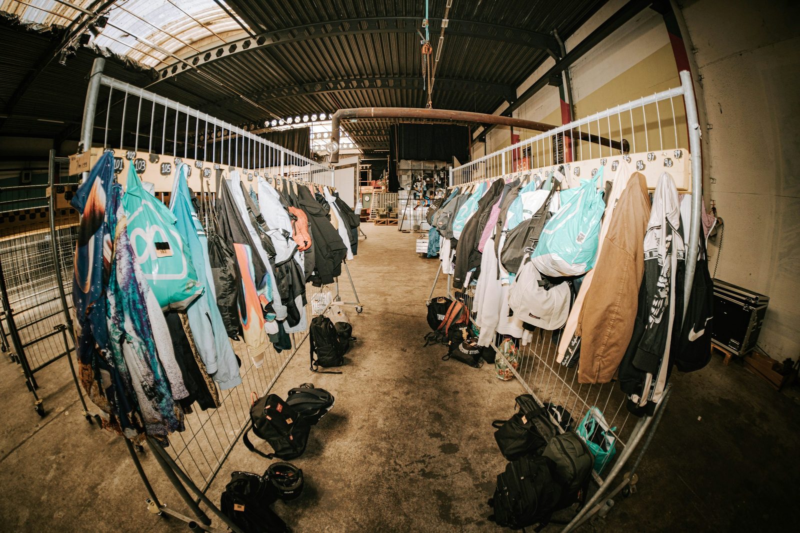 Clothing inventory on racks in a fulfillment facility