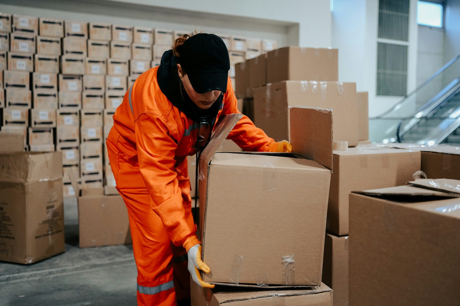 Warehouse worker preparing marketplace orders for shipment