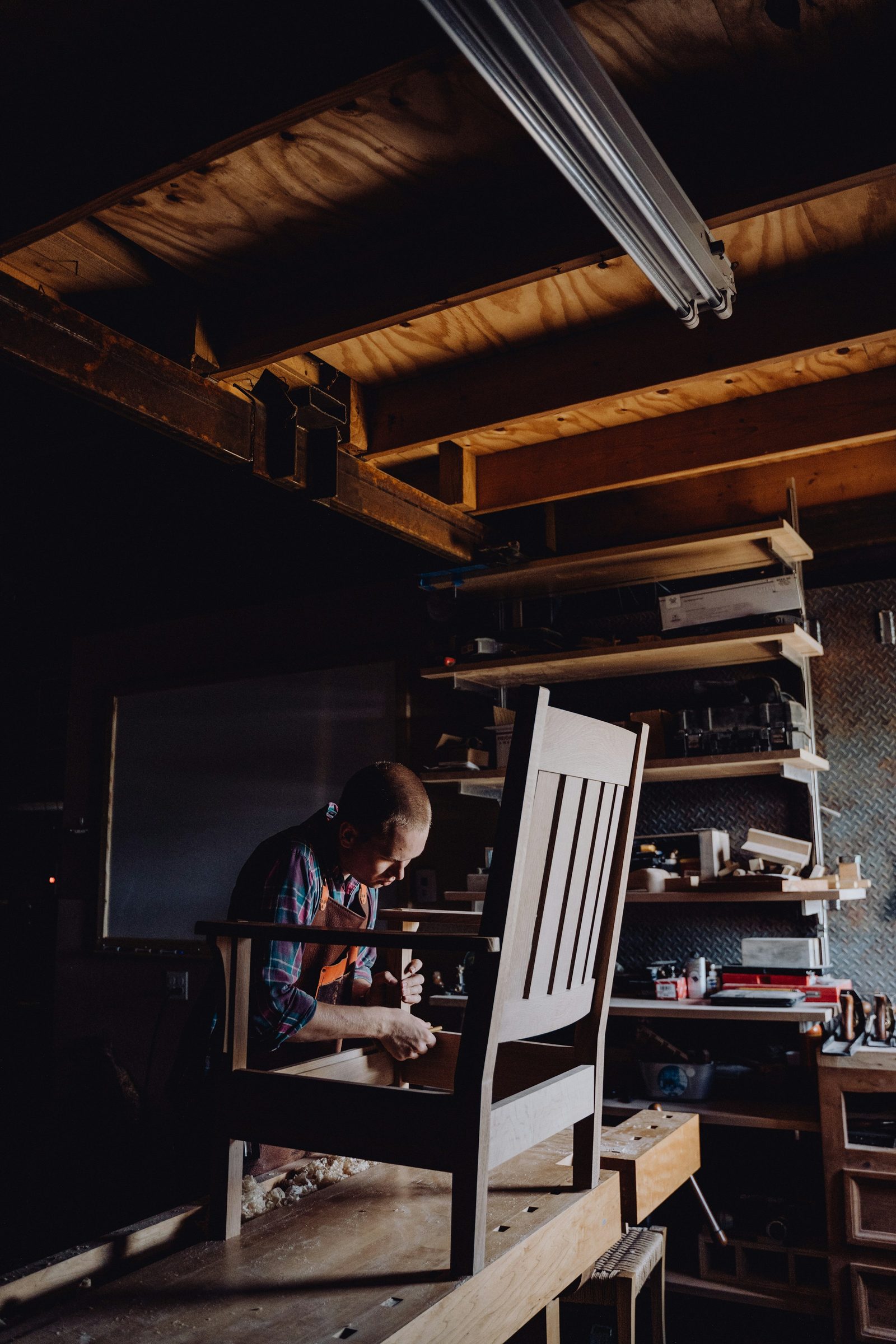 Small business owner working in a warehouse or workshop